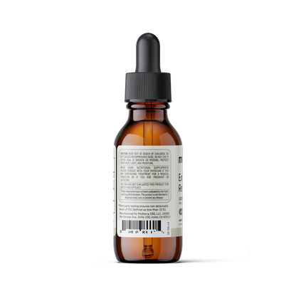 A brown glass dropper bottle with a black cap is shown from the back, displaying a white label with various text and a barcode. The bottle appears to contain an amber-colored liquid product, likely Enhanced Relief Broad Spectrum CBD Oil from Medterra, which emphasizes the entourage effect for cosmetic or medical use.