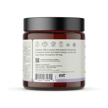 A brown jar with a black lid. The label displays various product details, including icons and text. The text reads, "Medterra's Focus CBD Gummies combine premium CBD with powerful botanicals to improve focus and boost cognitive enhancement, so you can stay sharp throughout the day." Contact information is also listed.