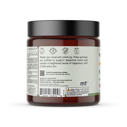 A dark amber jar with a black lid is displayed, containing Medterra Mood Boost CBD Gummies. The label highlights the product's purpose: boosting mood and dopamine levels for increased happiness. Infused with CBD and saffron, it provides a holistic approach to wellness. Contact details and a QR code for detailed lab results are included.