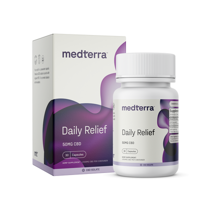 A white bottle and box of Medterra's Daily Relief CBD Isolate Capsules. The label indicates 30 capsules, each offering 50mg of CBD Isolate. The packaging features a purple and black design with white text, highlighting the use of organic MCT Coconut Oil for enhanced absorption.