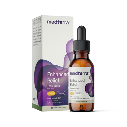 A box and bottle of Medterra's Enhanced Relief Broad Spectrum CBD Oil, containing 1000mg of Broad Spectrum CBD per bottle. The bottle includes a dropper and features a label indicating citrus flavor in tincture form. Both the packaging and the bottle label boast a modern design with purple waves and informational text, emphasizing the natural benefits of the hemp plant.
